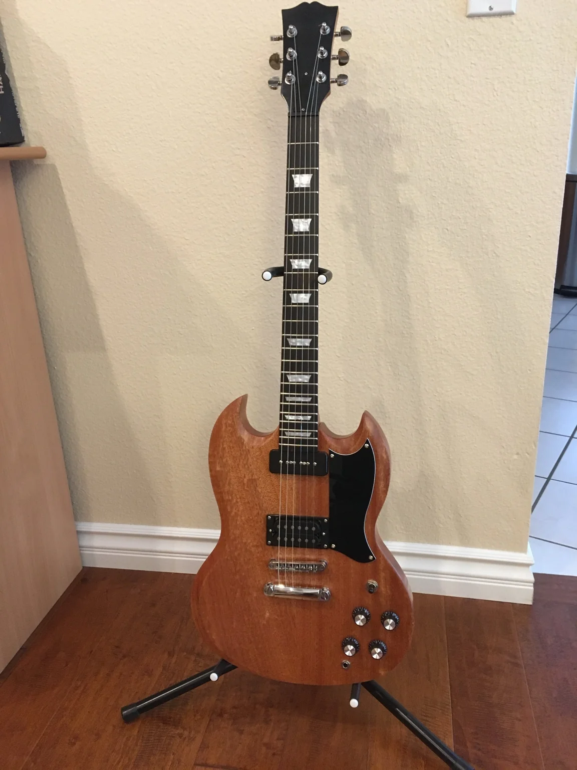 Completed SG-style guitar