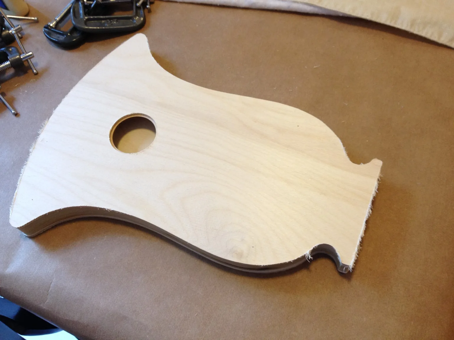 Handmade lyre construction: shaping the baltic birch soundboard