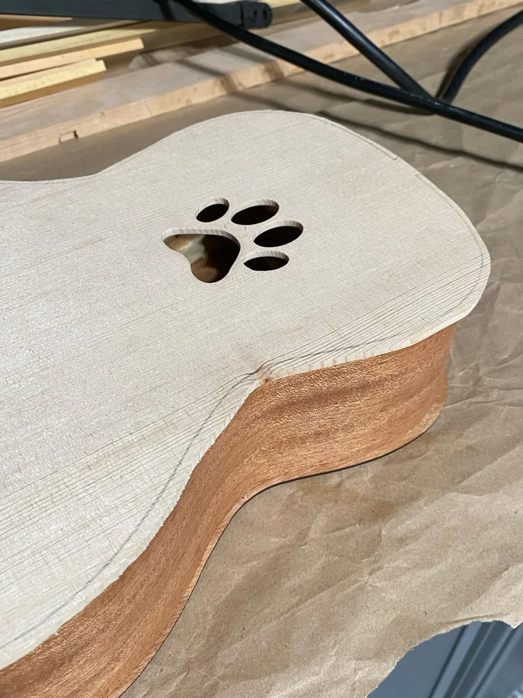 Pug-a-lele construction: joining the soundboard and sides